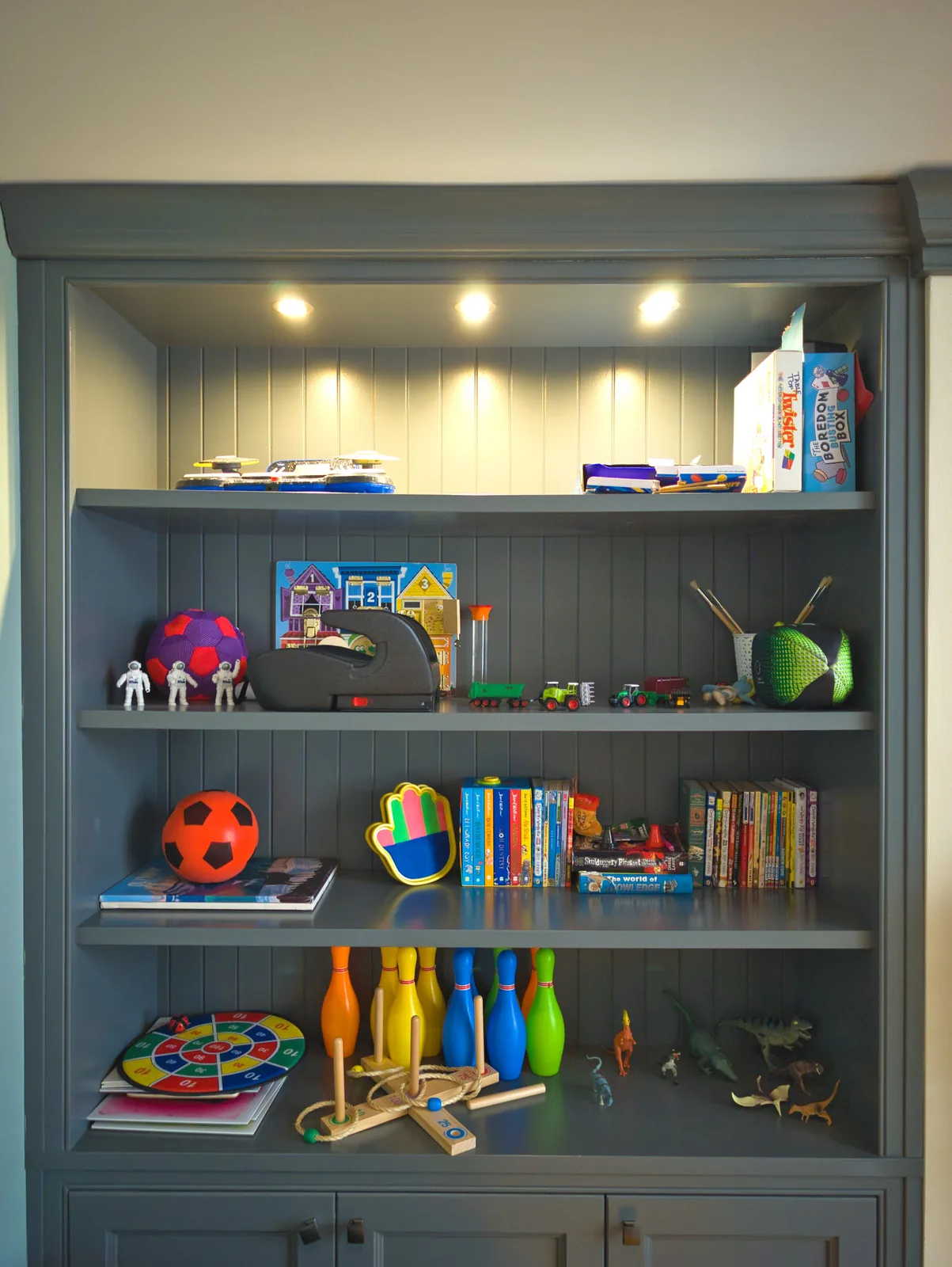 Shelves of toys, books and games